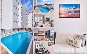 2 QUARTOS com Churrasqueira na Varanda, Piscina, Garagem interna, WiFi 500mbps, Ar Condicionado e Telas de Proteção